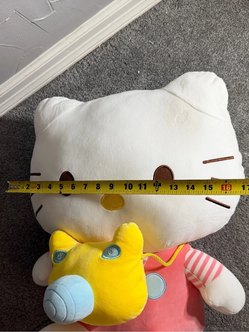 Jumbo sario hello kitty plush pink stripped shirt with yellow camera crossbody